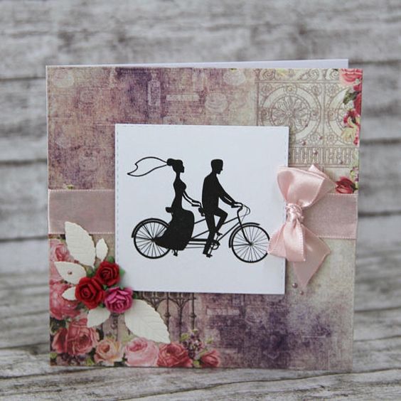 Wedding card pair on bycicle