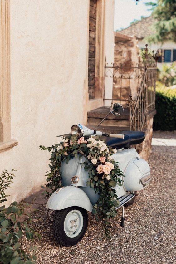 The breathtaking views of this Italian destination wedding have us ready to travel! A neutral color palette with lots of greenery and pops of pink gives an organic feel. The stunning architecture of the italian castle adds texture and interest to this romantic wedding. #ruffledblog