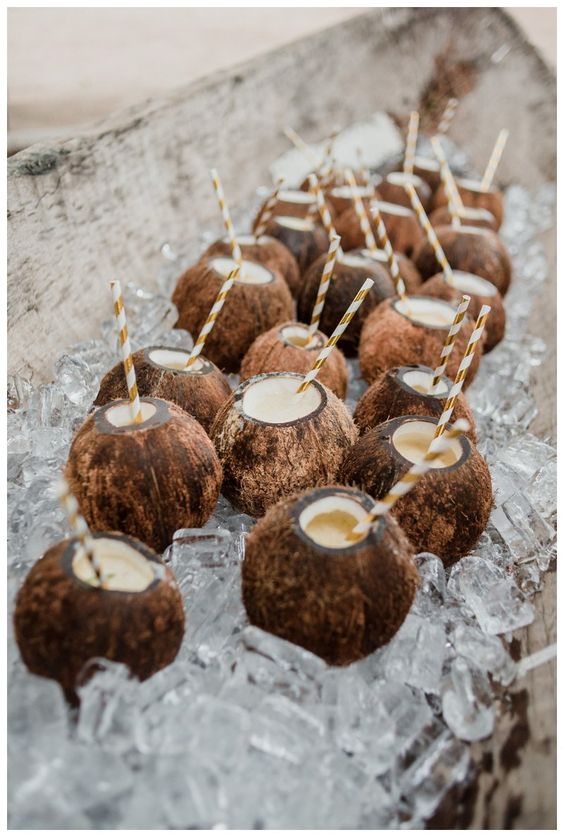 Coconut drinks at tropical wedding at Pangas Beach Club in Tamarindo Costa Rica. Photographed by Kristen M. Brown, Samba to the Sea Photography. Costa Rica beach wedding, Costa Rica wedding photographer, Costa Rica wedding Tamarindo, Costa Rica wedding locations, Costa Rica wedding ideas, Costa Rica wedding photography, Costa Rica wedding Guanacaste, Pangas Beach Club wedding, Tamarindo wedding #costaricawedding #costarica #destinationawedding
