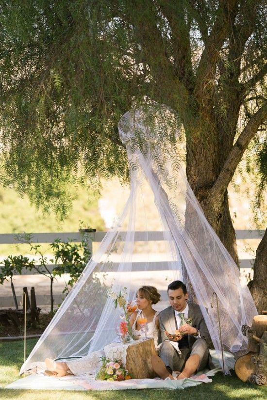 Such a fun idea! Just a bit of lace, a comfy blanket, and a tree stump to make this gorgeous setup!